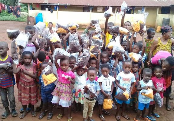 Students receive their school uniforms